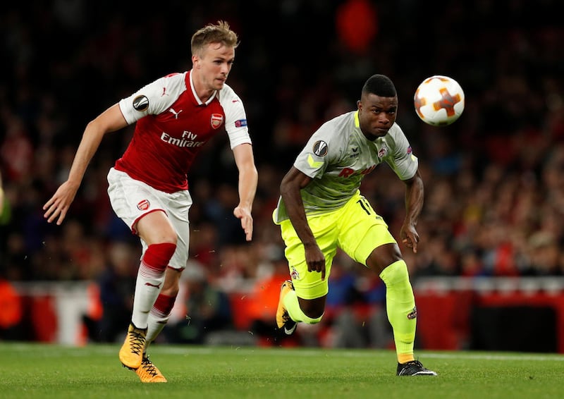 Arsenal's Rob Holding in action with Cologne's Jhon Cordoba. John Sibley / Reuters