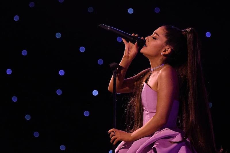 NEW YORK, NY - DECEMBER 06: Ariana Grande preforms at Billboard Women In Music 2018 on December 6, 2018 in New York City.   Mike Coppola/Getty Images for Billboard /AFP