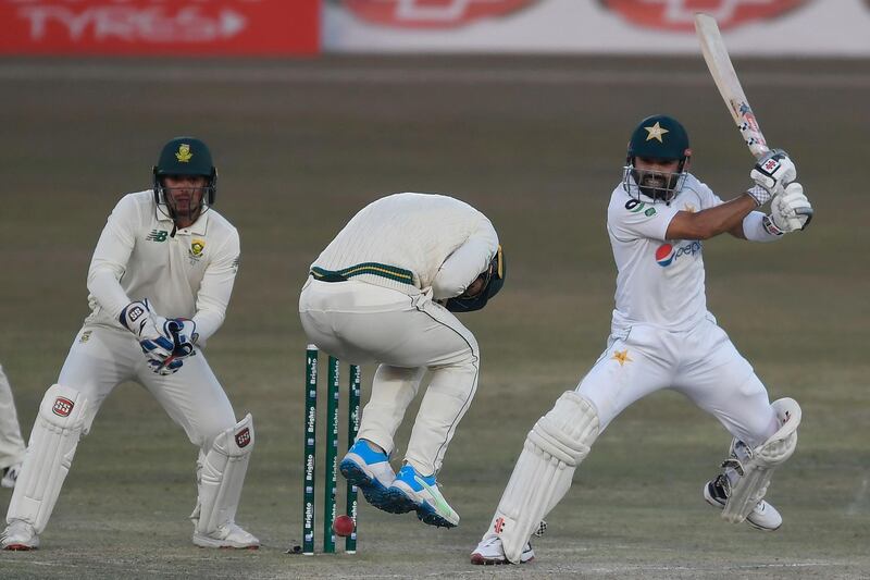 Pakistan's Mohammad Rizwan plays a shot on his way to an unbeaten 28. AFP