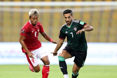 Ali Mabkhout of the UAE battles with Kushedya Hari Yudo of Indonesia during the game between the UAE and Indonesia in the World cup qualifiers at the Zabeel Stadium, Dubai on June 11th, 2021. Chris Whiteoak / The National. 
Reporter: John McAuley for Sport