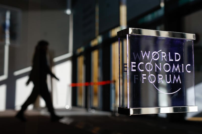 A logo sits on a window at the entrance hall of the Congress Center ahead of the World Economic Forum (WEF) in Davos, Switzerland, on Monday, Jan. 20, 2020. World leaders, influential executives, bankers and policy makers attend the 50th annual meeting of the World Economic Forum in Davos from Jan. 21 - 24. Photographer: Jason Alden/Bloomberg