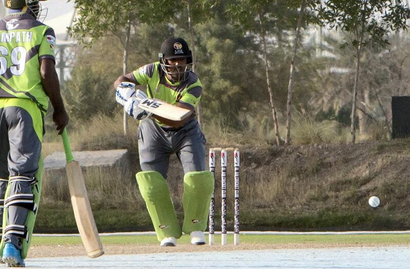 Al Ain, United Arab Emirates - Mohammed Usman of Dragons team batting the ball at the cricket match between Dragons vs Chennai at Al Ain Cricket Club, Equestrian Shooting & Golf Club.  Ruel Pableo for The National 