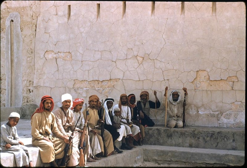 The guards of Sheikh Rashid bin Humaid Al Nuaimi, Ruler of Ajman, outside of his residence, taken at around 1957.