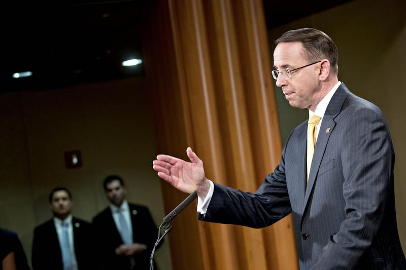 Rod Rosenstein, deputy attorney general, speaks during a news conference at the Department of Justice in Washington, D.C., U.S., on Friday, Feb. 16, 2018. Rosenstein briefed the media about U.S. Special Counsel Robert Mueller announcing an indictment of 13 Russian nationals and three Russian entities, accusing them of interfering in the 2016 presidential election and operating fake social media accounts. Photographer: Andrew Harrer/Bloomberg