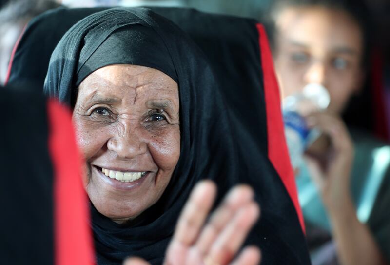 A Sudanese woman arrives at Karkar bus terminal near Aswan, southern Egypt after fleeing the fighting in her country. EPA