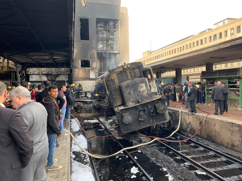A destroyed train on the tracks at Cairo's main train station. EPA