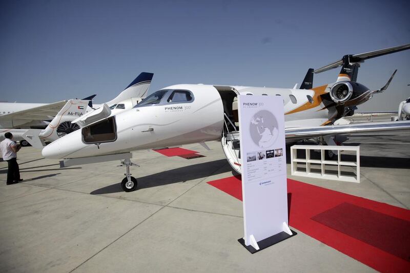An Embraer Phenom 300 on display at the Abu Dhabi Air Expo. Business jet sales are expected to rebound. Sammy Dallal / The National