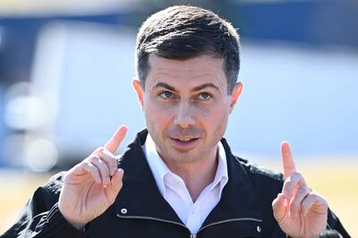 Transport Secretary Pete Buttigieg speaks as he visits the site of the derailment. Reuters