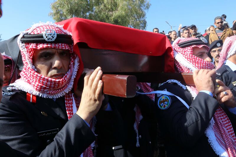Jordanian soldiers and mourners carry the coffin of Col Abdul Razzaq Al Dalabeh, the deputy police director of Maan province, during his funeral procession in Jarash on December 16, 2022.  EPA