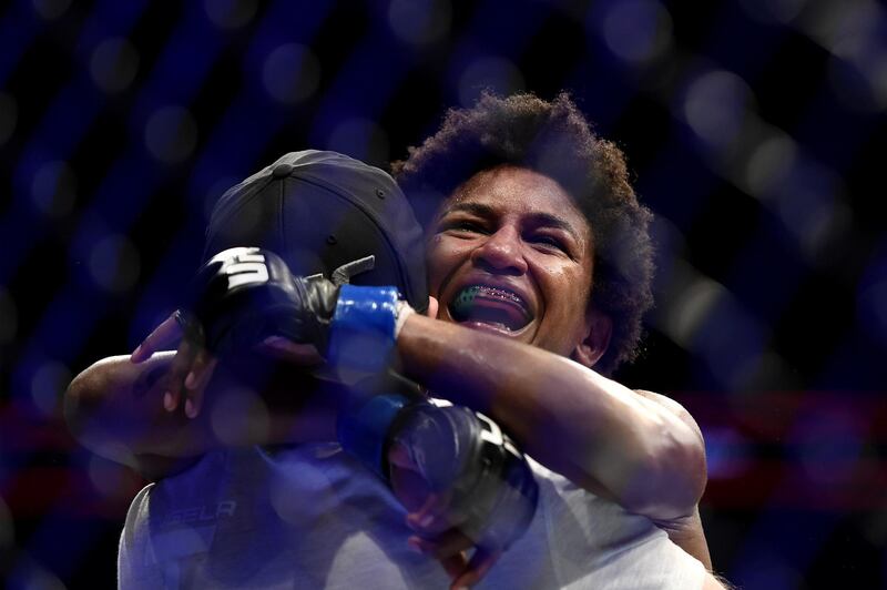 Angela Hill reacts after her Womens Strawweight bout against Claudia Gadelha (not pictured) at VyStar Veterans Memorial Arena. AFP