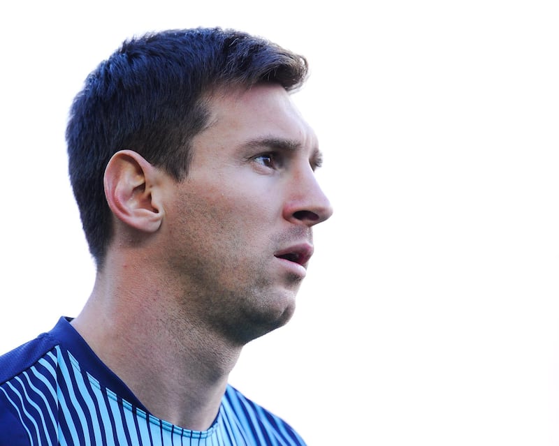 BARCELONA, SPAIN - APRIL 05:  Lionel Messi of FC Barcelona looks on  during warm up prior to the La Liga match between FC Barcelona and Real Betis Balompie at Camp Nou on April 5, 2014 in Barcelona, Spain.  (Photo by David Ramos/Getty Images)