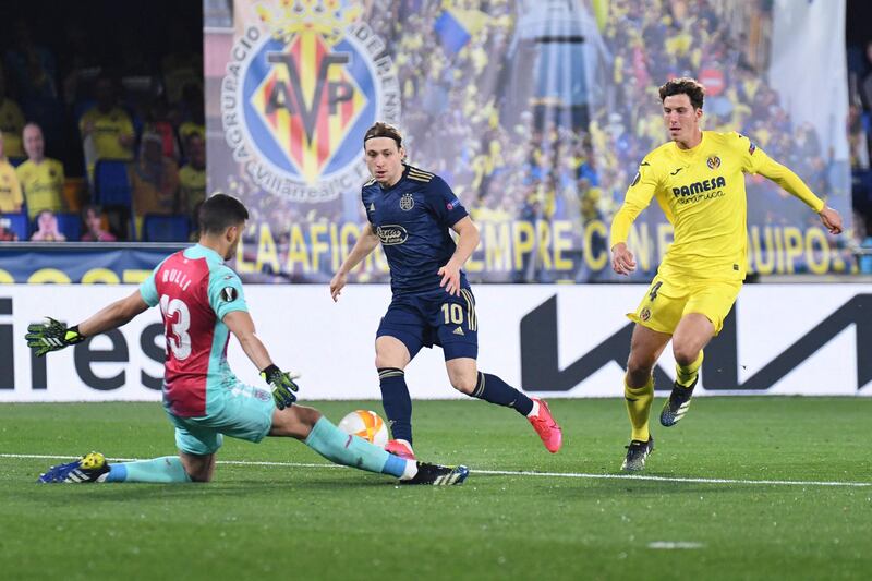 VILLARREAL RATINGS: Geronimo Rulli – 6 – Could do little to prevent the Pepe penalty. He’d had a quiet night otherwise and wasn’t called upon too often, until he made an important stop to deny Aubameyang late on. AFP