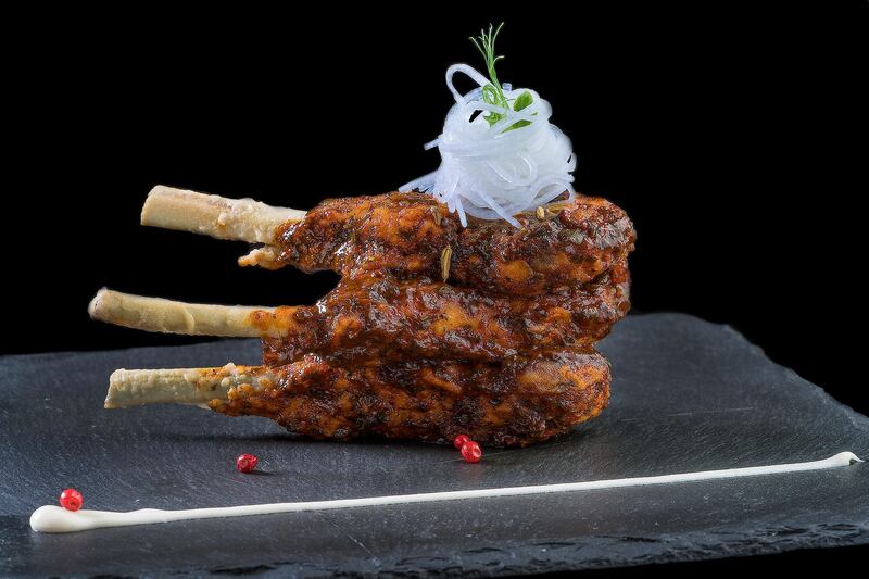 CARNIVORE CUTS: Achari-glazed lamb chops with puffed amaranth, Dh20, Jodhpur Royal Dining