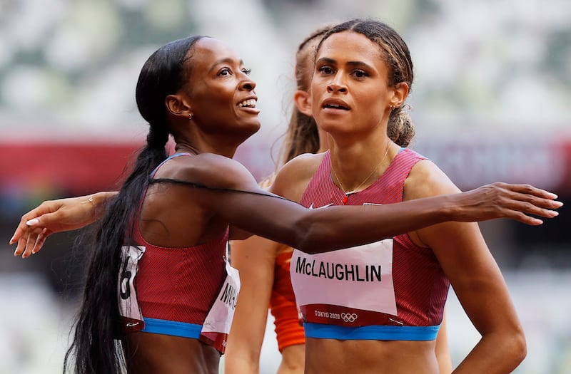 Winner Sydney McLaughlin, right, of the US and second-placed Dalilah Muhammad of the US after the Women's 400m Hurdles final.