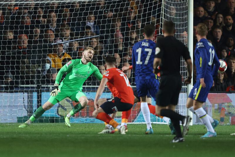 Luton Town's Carlos Mendes Gomes watches as Chelsea's Saul levels. AP