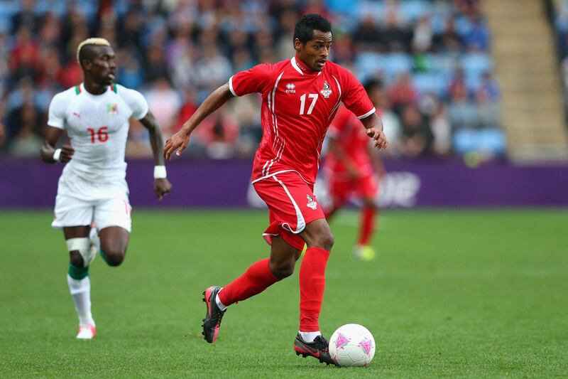 COVENTRY, ENGLAND - AUGUST 01:  Mohamed Fawzi of United Arab Emirates dribbles the ball during the Men's Football first round Group D Match between Senegal and United Arab Emirates, on Day 5 of the London 2012 Olympic Games at City of Coventry Stadium on August 1, 2012 in Coventry, England.  (Photo by Cameron Spencer/Getty Images)
