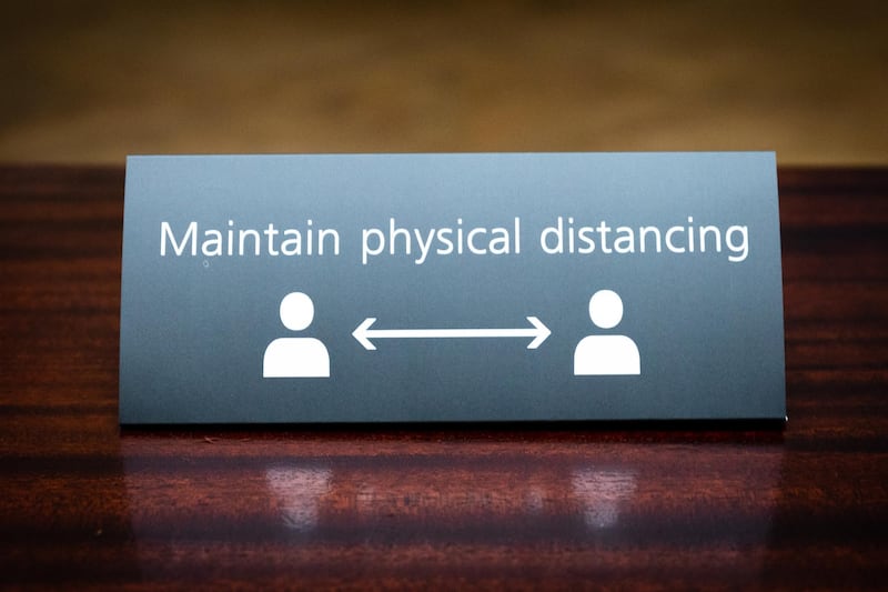 A 'maintain physical distancing' sign seen on a table at the National Gallery as it prepares to reopen to the public this week. EPA