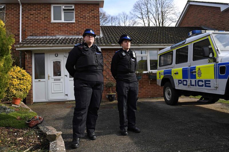 (FILES) In this file photo taken on March 06, 2018 British Police Community Support Officers stand on duty outside a residential property in Salisbury, southern England, on March 6, 2018, believed to have been cordonned off in connection with the major incident which started at The Maltings shopping centre in Salisbury on March 4.
Former Russian spy Sergei Skripal and his daughter first came into contact with a nerve agent at their home address in Britain, police said March 28 as the high-profile probe into the attack continues. / AFP PHOTO / Chris J Ratcliffe