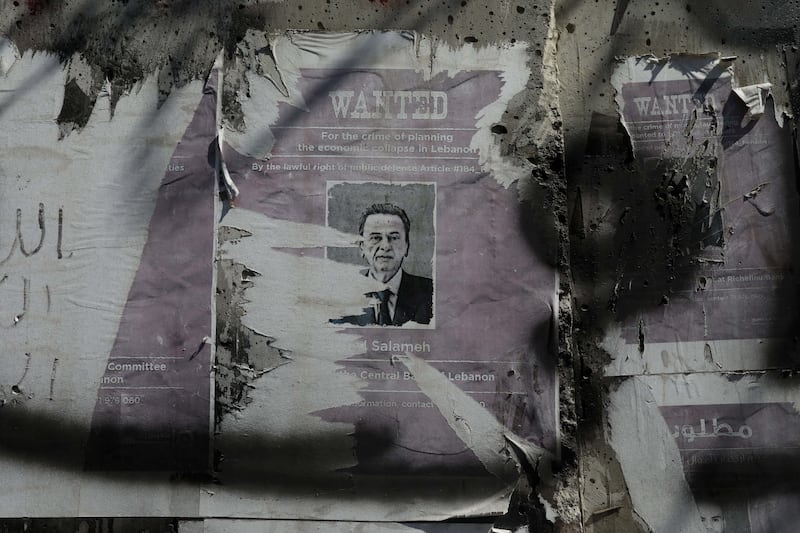 Posters on the building of the central bank of Lebanon in Beirut, days after the governor Riad Salameh ended his 30 years in office on August 4, last year. Getty Images