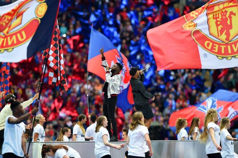 Tinie Tempah performs prior to the FA Cup Final match between Manchester United and Crystal Palace at Wembley Stadium on May 21, 2016 in London, England. (Shaun Botterill/Getty Images)