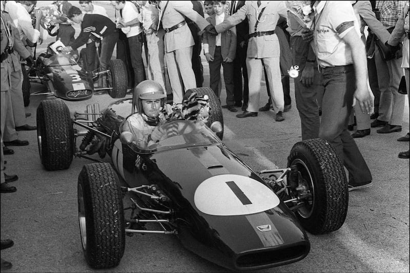 Jack Brabham won his third world title in 1966, in a car designed partly by him and which replaced the old front-engined ones. AFP