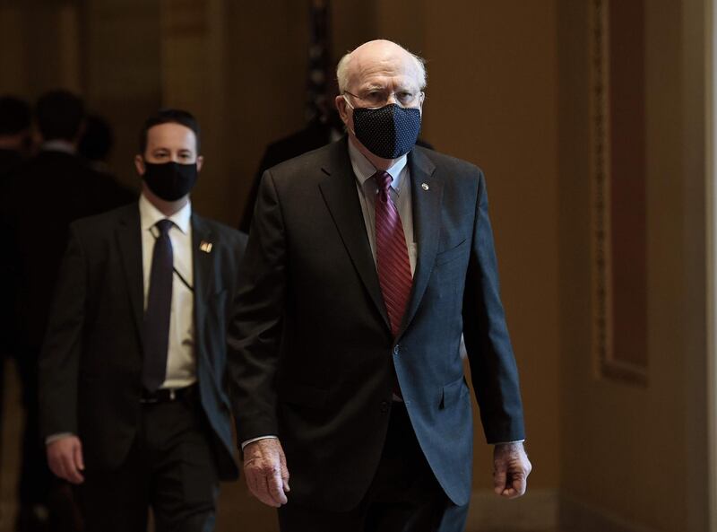 Senator Patrick J. Leahy (D-VT) walks to the Senate floor on Capitol Hill, February 2, 2021 in Washington, DC. Patrick Leahy, who was elected in 1974, is presiding over the impeachment trial of Donald Trump  trial as he is the senior senator of the party with the majority in the Senate, currently the Democrats.The 100 senators will serve as jurors in the trial in which former president Trump is accused of "incitement to insurrection" in the run-up to the violent storming of Congress by his supporters on January 6. The trial is due to open on February 9, 2021. / AFP / OLIVIER DOULIERY
