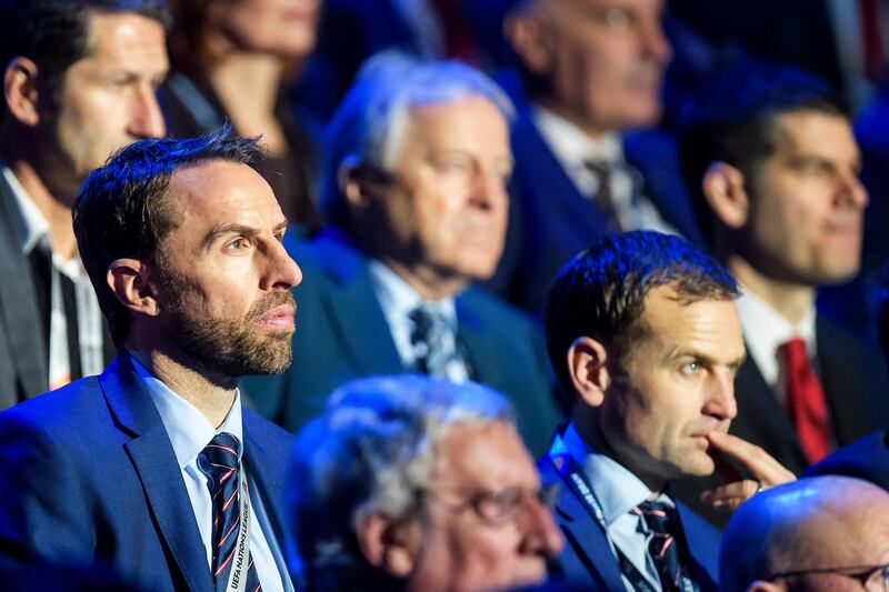 epa06470560 England national soccer team manager Gareth Southgate (L) attends the UEFA Nations League draw at the SwissTech Convention Center in Lausanne, Switzerland, 24 January 2018.  EPA/JEAN-CHRISTOPHE BOTT
