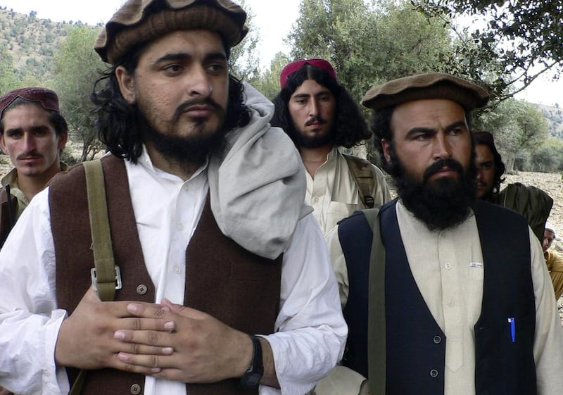 The killing of the Pakistani Taliban chief Hakimullah Mehsud, left, is expected to lead to repsisal attacks. Ishtiaq Mehsud / AP Photo