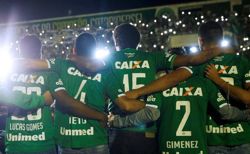 Players of Chapecoense who didn't travel to Colombia pay tribute to their fallen teammates at the Arena Conda stadium in Chapeco, Brazil on November 30, 2016. Ricardo Moraes / Reuters