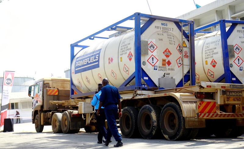 FILE PHOTO: Tanker trucks that used to haul oil products, ferry the crude oil during a pilot scheme to export crude oil, as they arrive at the Kenya Pipeline Company in the port city of Mombasa, Kenya June 7, 2018. REUTERS/Joseph Okanga/File Photo