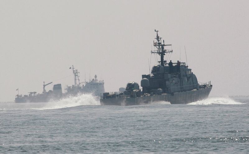 South Korean vessels near the maritime boundary with the North. Seoul said its navy fired warning shots at a North Korean merchant ship that crossed the boundary. AP