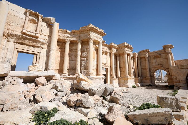 A picture shows a partial view of the damaged amphitheatre, in Syria's Roman-era ancient city of Palmyra on February 7, 2021, in the country's central province of Homs. - Syria has six sites listed on the UNESCO elite list of world heritage and all of them sustained some level of damage in the 10-year war. Besides Palmyra and Aleppo, the ancient cities of Damascus and Bosra also sustained some damage. (Photo by LOUAI BESHARA / AFP)