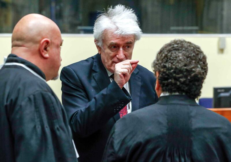 epa06686668 Former Bosnian Serb leader Radovan Karadzic appears in a courtroom before the International Residual Mechanism for Criminal Tribunals (MICT), which is handling outstanding war crimes cases for the Balkans and Rwanda, in The Hague, Netherlands, 23 April 2018.  Former Bosnian Serb leader Karadzic appeals against his conviction for genocide and a 40-year prison sentence. Karadzic was convicted in 2016 for war crimes committed, including the 1995 Srebrenica massacre.  EPA-EFE/Yves Herman / POOL *** Local Caption *** 54282807