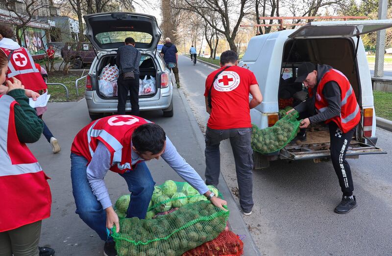 Ukrainians helping out in a Red Cross volunteer centre in Kharkiv, Ukraine. EPA