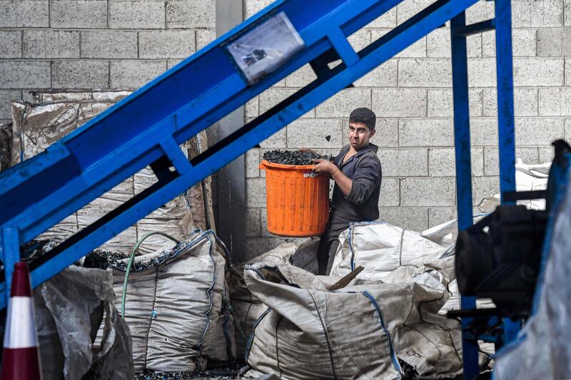 Each tile takes about 125 plastic bags out of the environment, says business partner Amr Shalan, 26
