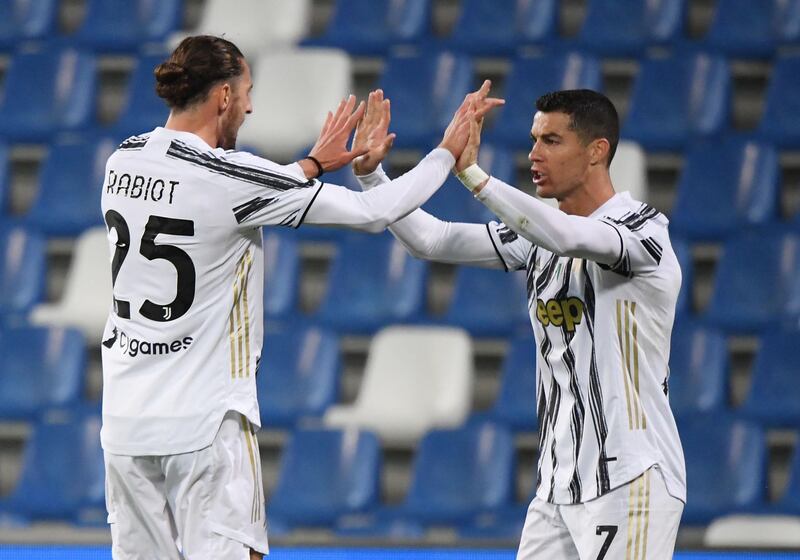 Adrien Rabiot celebrates scoring their first goal with Cristiano Ronaldo. Reuters