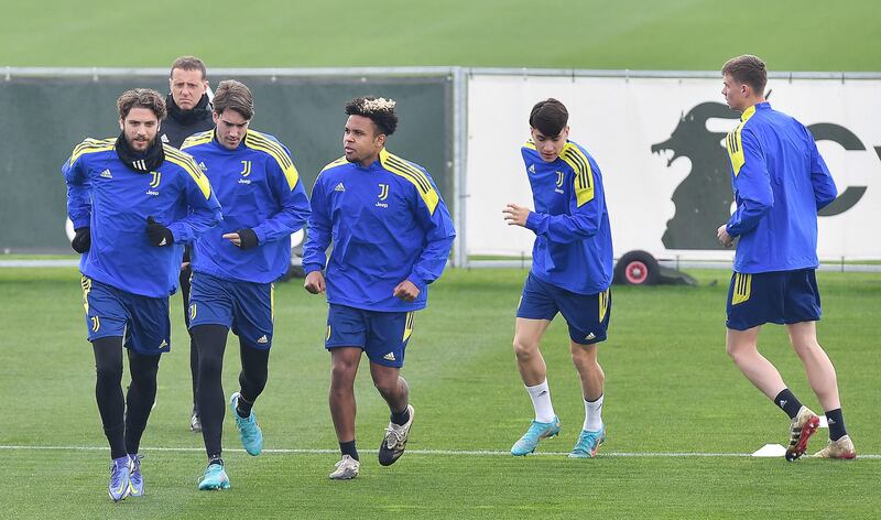Manuel Locatelli, Dusan Vlahovic and Weston McKennie train in Turin for the Champions League game against Villareal. EPA