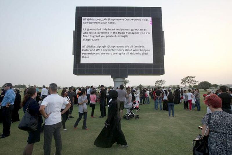 Doha, Qatar, May 29, 2012:

A cross section off Doha came out to Aspire Park today in honor of the victims who were kill in a tragic fire at the nearby Villagio mall. People from literally every community came out in an act of solidarity that could be considered rare for such a young burgeoning place that is seeking to find its identity with a large influx of foreign workers.
A large screen displayed messages from the community via Twitter.


Lee Hoagland/The National