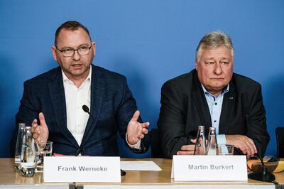 Chairman of the Verdi trade union Frank Werneke, left, and chairman of the EVG union Martin Burkert in Berlin on March. EPA