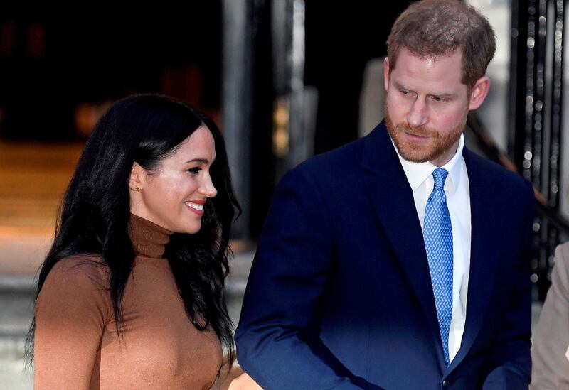 FILE PHOTO: Britain's Prince Harry and his wife Meghan, Duchess of Sussex, leave Canada House in London, Britain January 7, 2020. REUTERS/Toby Melville/File Photo/File Photo