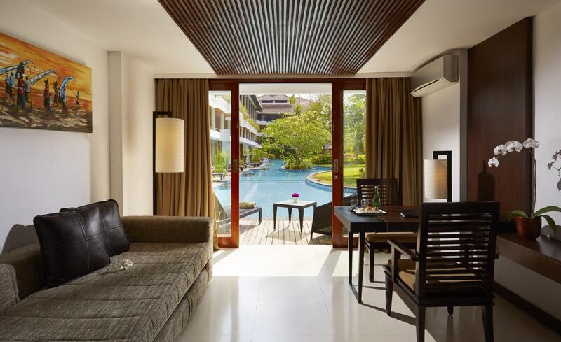 The balcony of the ground-floor rooms at the Melia is a mere step up from the lagoon-style pool. Courtesy: Melia Bali