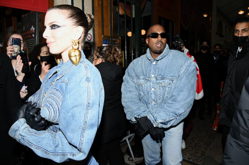 West and Julia Fox, who briefly dated him after his split with Kim Kardashian, at Paris Fashion Week. Getty Images