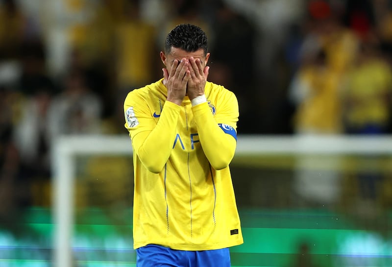 Al Nassr's Cristiano Ronaldo reacts after Al Ain's first goal. Getty Images