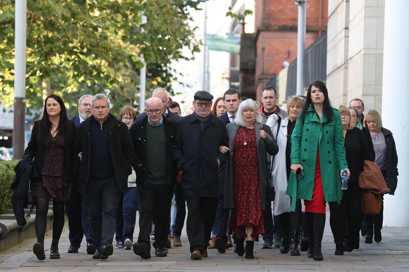 Relatives of Aidan McAnespie arrive with supporters at Laganside Courts in Belfast. PA