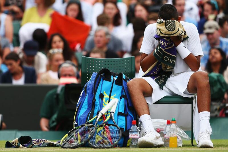 Nick Kyrgios reacts during his loss to Milos Raonic during their Wimbledon quarter-finals match on Wednesday. The 19-year-old had earlier caused a sensation beating Rafael Nadal in the fourth round. Clive Brunskill / Getty Images