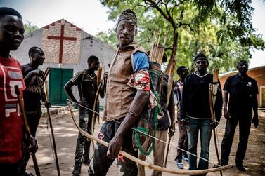 Hunters armed with bows and arrows in Dasso, Nigeria on February 18, 2019, just a few days ahead of the country's general election. AFP
