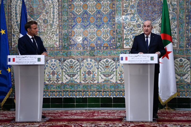 Algerian President Abdelmadjid Tebboune, right, with French President Emmanuel Macron in August, 2022.  Reuters