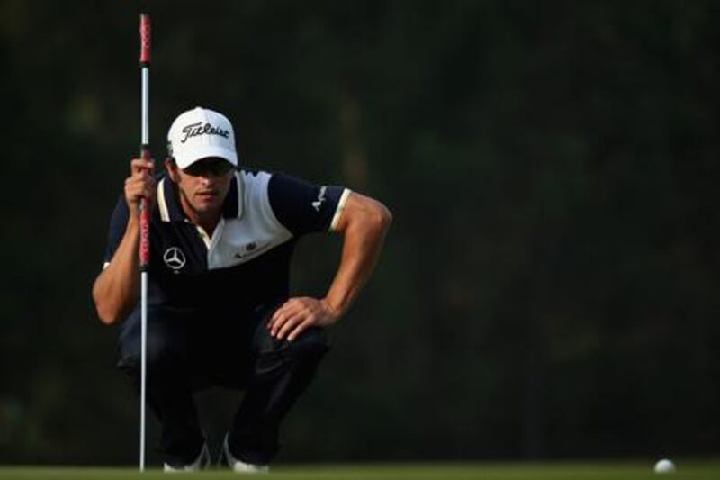 Adam Scott lines up a putt at the WGC HSBC Champions event in China