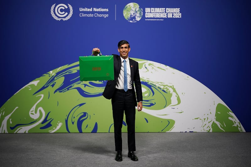 Mr Sunak arrives at COP26 in Glasgow in November 2021 when he was chancellor. Getty
