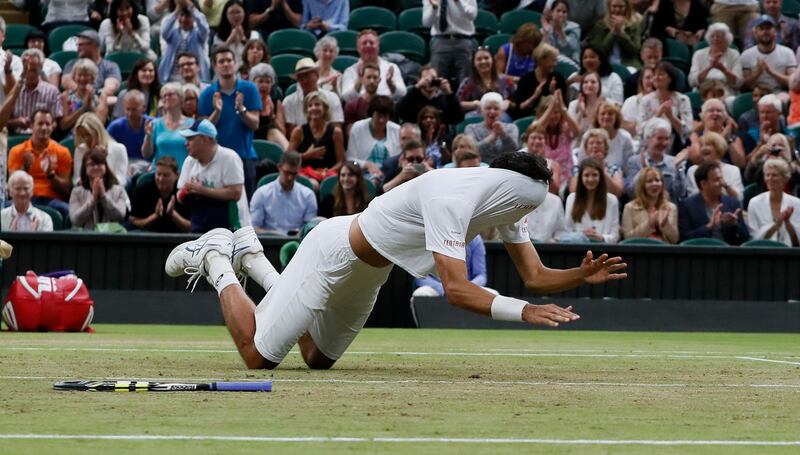 Brazil's Marcelo Melo celebrates after he and his playing partner, Poland's Lukasz Kubot, defeated Austria's Oliver Marach, and Croatia's Mate Pavic in the Men's Doubles final match on day twelve at the Wimbledon Tennis Championships. Kirsty Wigglesworth.